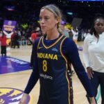 Aug 5, 2025; Los Angeles, California, USA; Indiana Fever guard Sophie Cunningham (8) leaves the court after the game against the LA Sparks at the Crypto.com Arena. Mandatory Credit: Kirby Lee-Imagn Images