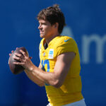 Aug 7, 2025; El Segundo, CA, USA; Los Angeles Chargers quarterback Justin Herbert (10) throws the ball during training camp at The Bolt.