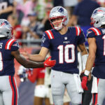 Aug 8, 2025; Foxborough, Massachusetts, USA; New England Patriots quarterback Drake Maye (10) celebrates after scoring a touchdown during the first half against the Washington Commanders at Gillette Stadium. Mandatory Credit: Paul Rutherford-Imagn Images