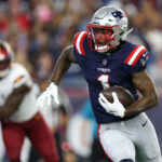 Aug 8, 2025; Foxborough, Massachusetts, USA; New England Patriots receiver Ja'Lynn Polk (1) runs the ball during the first half against the Washington Commanders at Gillette Stadium.