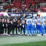 Aug 8, 2025; Atlanta, Georgia, USA; Atlanta Falcons and Detroit Lions players pray after an injury to safety Morice Norris (not pictured) in the fourth quarter at Mercedes-Benz Stadium.
