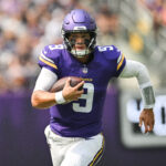 Aug 9, 2025; Minneapolis, Minnesota, USA; Minnesota Vikings quarterback J.J. McCarthy (9) scrambles for a gain against the Houston Texans during the first quarter at U.S. Bank Stadium. Mandatory Credit: Jeffrey Becker-Imagn Images