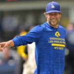 Aug 9, 2025; Inglewood, California, USA; Los Angeles Rams quarterback Matthew Stafford (9) walks on the field prior to the game against the Dallas Cowboys at SoFi Stadium.