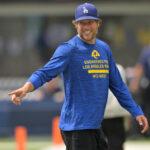 Aug 9, 2025; Inglewood, California, USA; Los Angeles Rams quarterback Matthew Stafford (9) walks on the field prior to the game against the Dallas Cowboys at SoFi Stadium. Mandatory Credit: Jayne Kamin-Oncea-Imagn Images
