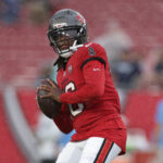 Aug 9, 2025; Tampa, Florida, USA; Tampa Bay Buccaneers quarterback Teddy Bridgewater (16) warms up before a preseason game against the Tennessee Titans at Raymond James Stadium. Mandatory Credit: Nathan Ray Seebeck-Imagn Images