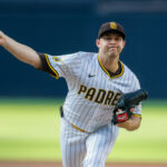 Aug 9, 2025; San Diego, California, USA; San Diego Padres starting pitcher Michael King (34) throws a pitch during the first inning against the Boston Red Sox at Petco Park. Mandatory Credit: David Frerker-Imagn Images