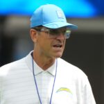 Chargers Harbaugh NCAA Aug 10, 2025; Inglewood, California, USA; Los Angeles Chargers head coach Jim Harbaugh reacts during the game against he New Orleans Saints at SoFi Stadium. Mandatory Credit: Kirby Lee-Imagn Images
