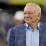 Aug 16, 2025; Arlington, Texas, USA; Dallas Cowboys owner Jerry Jones (left) looks on before the game against the Baltimore Ravens at AT&T Stadium. Mandatory Credit: Jerome Miron-Imagn Images