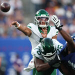 Aug 16, 2025; East Rutherford, New Jersey, USA; New York Jets quarterback Justin Fields (7) throws the ball during the first half against the New York Giants at MetLife Stadium. Mandatory Credit: Vincent Carchietta-Imagn Images