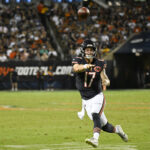 Aug 17, 2025; Chicago, Illinois, USA; Chicago Bears quarterback Tyson Bagent (17) throws the ball for a touchdown during the first half against the Buffalo Bills at Soldier Field. Mandatory Credit: Matt Marton-Imagn Images