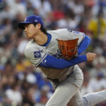 Aug 20, 2025; Denver, Colorado, USA; Los Angeles Dodgers two-way player Shohei Ohtani (17) delivers a pitch in third inning against the Colorado Rockies at Coors Field. Mandatory Credit: Ron Chenoy-Imagn Images