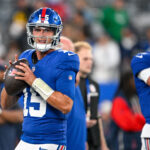 Aug 21, 2025; East Rutherford, New Jersey, USA; New York Giants quarterback Tommy DeVito (15) warms up before the game against the New England Patriots at MetLife Stadium.