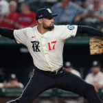 Aug 22, 2025; Arlington, Texas, USA; Texas Rangers starting pitcher Nathan Eovaldi (17) throws to the plate during the first inning against the Cleveland Guardians at Globe Life Field. Mandatory Credit: Raymond Carlin III-Imagn Images