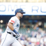 Aug 25, 2025; Seattle, Washington, USA; Seattle Mariners catcher Cal Raleigh (29) runs the bases after hitting a solo-home run against the San Diego Padres during the first inning at T-Mobile Park. The home run is the 50th of the season for Raleigh. Mandatory Credit: Joe Nicholson-Imagn Images