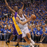 May 6, 2011; Dallas, TX, USA; Dallas Mavericks forward Dirk Nowitzki (41) drives in the first quarter of game three against Los Angeles Lakers guard Kobe Bryant (24) of the second round of the 2011 NBA playoffs at American Airlines Center.
