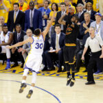 Jun 19, 2016; Oakland, CA, USA; Cleveland Cavaliers guard Kyrie Irving (2) shoots the the game winning shot during the fourth quarter against Golden State Warriors guard Stephen Curry (30) in game seven of the NBA Finals at Oracle Arena. Mandatory Credit: Kelley L Cox-USA TODAY Sports