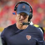 Aug 22, 2025; Kansas City, Missouri, USA; Chicago Bears head coach Ben Johnson on field against the Kansas City Chiefs during the second half of the game at GEHA Field at Arrowhead Stadium.