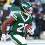 Jan 5, 2025; East Rutherford, New Jersey, USA; New York Jets running back Breece Hall (20) during pregame warmups for their game against the Miami Dolphins at MetLife Stadium.