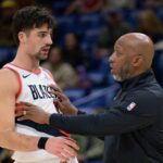 Jan 8, 2025; New Orleans, Louisiana, USA; Portland Trail Blazers head coach Chauncey Billups talks with forward Deni Avdija (8), next to forward Toumani Camara (33) and center Deandre Ayton (2) against the Portland Trail Blazers during the first half at Smoothie King Center.