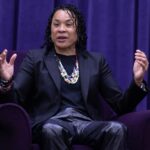 University of South Carolina women's basketball coach Dawn Staley answers a question by moderator Dan Hughes during the University of Mount Union's Schooler Lecture speaker series April 23, 2025, in Alliance, Ohio.