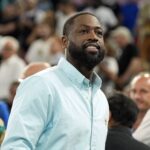 Aug 6, 2024; Paris, France; Dwyane Wade looks on at halftime between France and Canada in a men’s basketball quarterfinal game during the Paris 2024 Olympic Summer Games at Accor Arena
