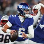 Aug 21, 2025; East Rutherford, New Jersey, USA; New York Giants quarterback Jaxson Dart (6) drops back to pass during the first half against the New England Patriots at MetLife Stadium.