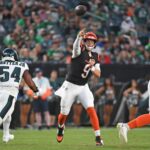 Aug 7, 2025; Philadelphia, Pennsylvania, USA; Cincinnati Bengals quarterback Joe Burrow (9) throws a touchdown pass during the first quarter against the Philadelphia Eagles at Lincoln Financial Field.