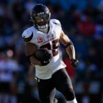 Houston Texans running back Joe Mixon (28) scores a touchdown during the third quarter of an NFL football matchup Sunday, Dec. 1, 2024 at EverBank Stadium in Jacksonville, Fla. The Texans held off the Jaguars 23-20.