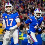 Nov 17, 2024; Orchard Park, New York, USA; Buffalo Bills quarterback Josh Allen (17) reacts to scoring a touchdown against the Kansas City Chiefs during the second half at Highmark Stadium.