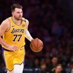 Apr 11, 2025; Los Angeles, California, USA; Los Angeles Lakers guard Luka Doncic (77) moves the ball against the Houston Rockets during the first half at Crypto.com Arena.