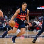 Feb 10, 2025; Washington, District of Columbia, USA; Washington Wizards guard Malcolm Brogdon (15) handles the ball during the first quarter against the San Antonio Spurs at Capital One Arena.