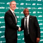New York Jets General Manager Darren Mougey and Jets Head Coach Aaron Glenn, shake hands as they pose for the press, at the Atlantic Health Jets Training Center, Monday, January 27, 2025, in Florham Park. Mougey and Glenn were introduced to the press in their new positions for the first time.