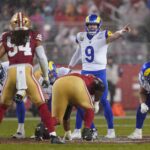 Dec 12, 2024; Santa Clara, California, USA; Los Angeles Rams quarterback Matthew Stafford (9) directs teammates before a play against the San Francisco 49ers in the second quarter at Levi's Stadium.