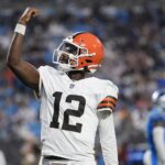 Aug 8, 2025; Charlotte, North Carolina, USA; Cleveland Browns quarterback Shedeur Sanders (12) celebrates his touchdown pass against the Carolina Panthers during the second quarter at Bank of America Stadium.