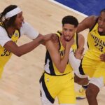 May 21, 2025; New York, New York, USA; Indiana Pacers guard Tyrese Haliburton (0) celebrates with teammates after tying the game in the fourth quarter to send the game to overtime against the New York Knicks during game one of the eastern conference finals for the 2025 NBA Playoffs at Madison Square Garden.