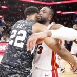 Mar 20, 2019; San Antonio, TX, USA; San Antonio Spurs small forward Rudy Gay (22) hugs Miami Heat shooting guard Dwyane Wade (right) after the game at AT&T Center. Mandatory Credit: Soobum Im-USA TODAY Sports