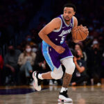Jan 7, 2022; Los Angeles, California, USA; Los Angeles Lakers guard Talen Horton-Tucker (5) moves the ball up court against the Atlanta Hawks during the second half at Crypto.com Arena. Mandatory Credit: Gary A. Vasquez-USA TODAY Sports