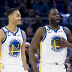 Jordan Poole Warriors Draymond Green Oct 14, 2022; San Francisco, California, USA; Golden State Warriors guard Jordan Poole (3) and forward Draymond Green (23) re-enter the court after a time-out during the first half of the game against the Denver Nuggets at Chase Center. Mandatory Credit: John Hefti-USA TODAY Sports