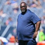 Aug 12, 2023; Chicago, Illinois, USA; Tennessee Titans assistant head coach Terrell Williams watches his team warm up before a game against the Chicago Bears at Soldier Field. Mandatory Credit: Jamie Sabau-USA TODAY Sports