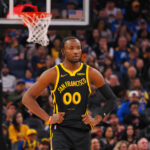 Warriors Nov 12, 2023; San Francisco, California, USA; Golden State Warriors forward Jonathan Kuminga (00) between plays against the Minnesota Timberwolves during the third quarter at Chase Center.