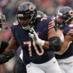 Dec 31, 2023; Chicago, Illinois, USA; Chicago Bears offensive lineman Braxton Jones (70) blocks against the Atlanta Falcons at Soldier Field. Mandatory Credit: Jamie Sabau-USA TODAY Sports