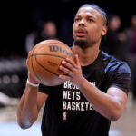 Mar 4, 2024; Brooklyn, New York, USA; Brooklyn Nets guard Dennis Smith Jr. (4) warms up before a game against the Memphis Grizzlies at Barclays Center. Mandatory Credit: Brad Penner-USA TODAY Sports