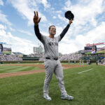 Sep 6, 2024; Chicago, Illinois, USA; New York Yankees first baseman Anthony Rizzo (48) waves to fans as he is introduced before a baseball game against the Chicago Cubs at Wrigley Field. Mandatory Credit: Kamil Krzaczynski-Imagn Images