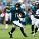 Oct 6, 2024; Jacksonville, Florida, USA; Jacksonville Jaguars wide receiver Gabe Davis (0) runs with the ball against the Indianapolis Colts in the second quarter at EverBank Stadium. Mandatory Credit: Nathan Ray Seebeck-Imagn Images