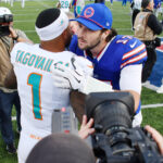Nov 3, 2024; Orchard Park, New York, USA; Buffalo Bills quarterback Josh Allen (17) greets Miami Dolphins quarterback Tua Tagovailoa (1) after a game at Highmark Stadium. Mandatory Credit: Mark Konezny-Imagn Images