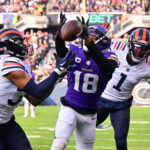 Nov 24, 2024; Chicago, Illinois, USA; NFL; Chicago Bears defensive back Jonathan Owens (36) is called for pass interference as he intercepts a pass intended for Minnesota Vikings wide receiver Justin Jefferson (18) during the second quarter at Soldier Field.