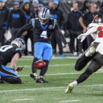 Dec 1, 2024; Charlotte, North Carolina, USA; Carolina Panthers place kicker Eddy Pineiro (4) kicks a field goal against the Tampa Bay Buccaneers during the second quarter at Bank of America Stadium. Mandatory Credit: Jim Dedmon-Imagn Images
