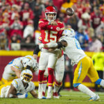 Dec 8, 2024; Kansas City, Missouri, USA; Kansas City Chiefs quarterback Patrick Mahomes (15) throws a pass during the second half against the Los Angeles Chargers at GEHA Field at Arrowhead Stadium.