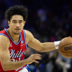 Dec 13, 2024; Philadelphia, Pennsylvania, USA; Philadelphia 76ers guard Jared McCain (20) in action against the Indiana Pacers at Wells Fargo Center. Mandatory Credit: Bill Streicher-Imagn Images