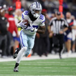 Dec 22, 2024; Arlington, Texas, USA; Dallas Cowboys wide receiver CeeDee Lamb (88) runs after catching a pass against the Tampa Bay Buccaneers in the second quarter at AT&T Stadium.